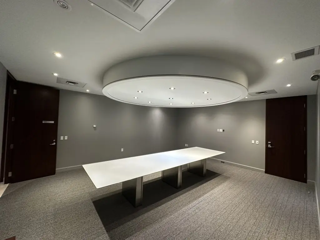 Completed office fit-out with workstations and glazing after renovation