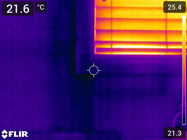 After Thermal image of a window assembly and surrounding wall captured during an infrared building envelope survey