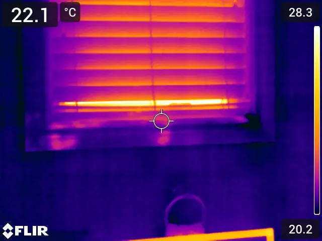 Before Thermal image of a window assembly and surrounding wall captured during an infrared building envelope survey